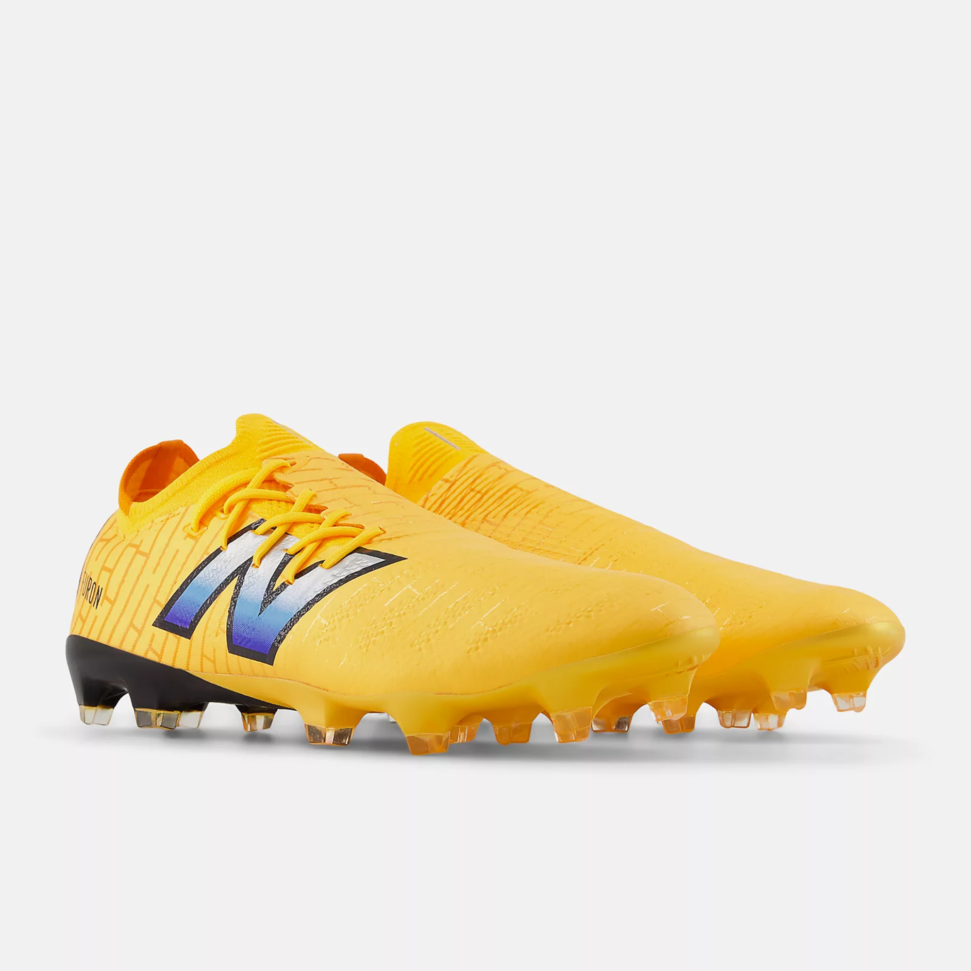 New Balance Furon Pro FG V7 Sun Glow Silver Metallic Black